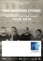 TWO WOODEN STONES